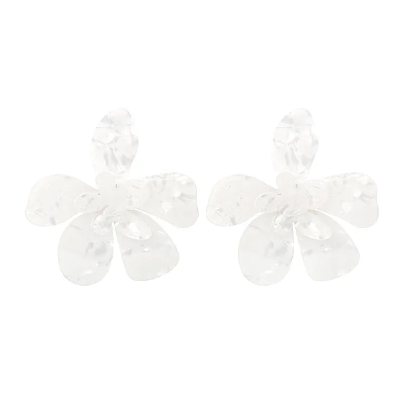 Boucle d’oreille fleur resine