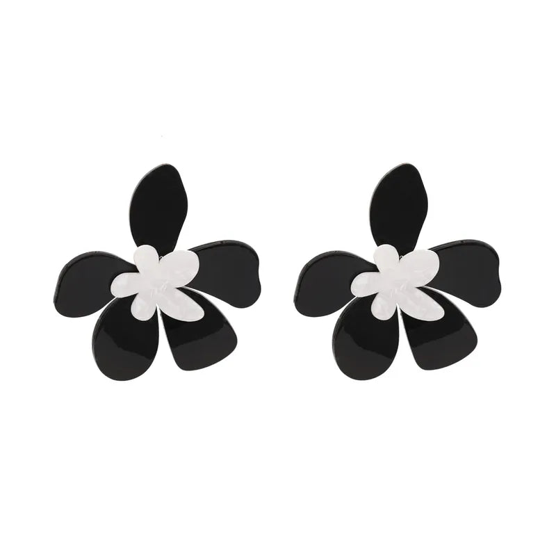 Boucle d’oreille fleur resine