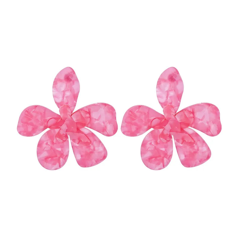 Boucle d’oreille fleur resine