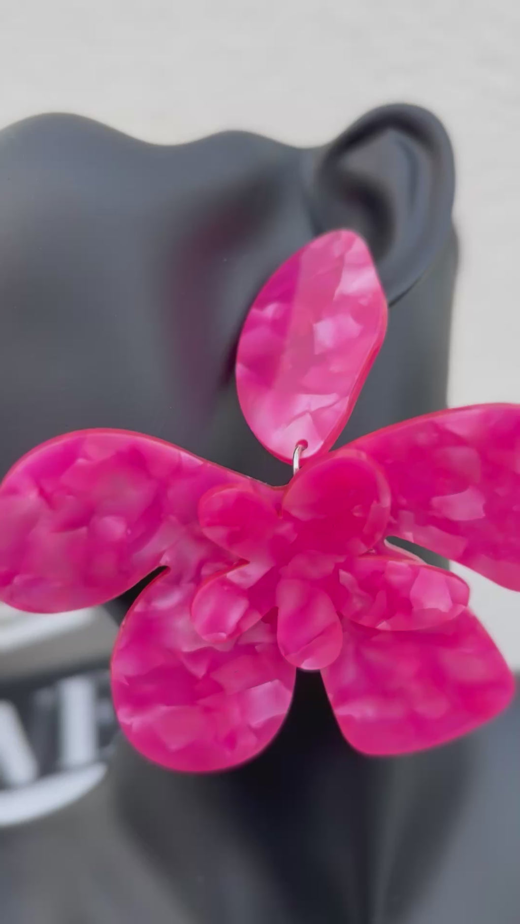 Boucle d’oreille fleur resine