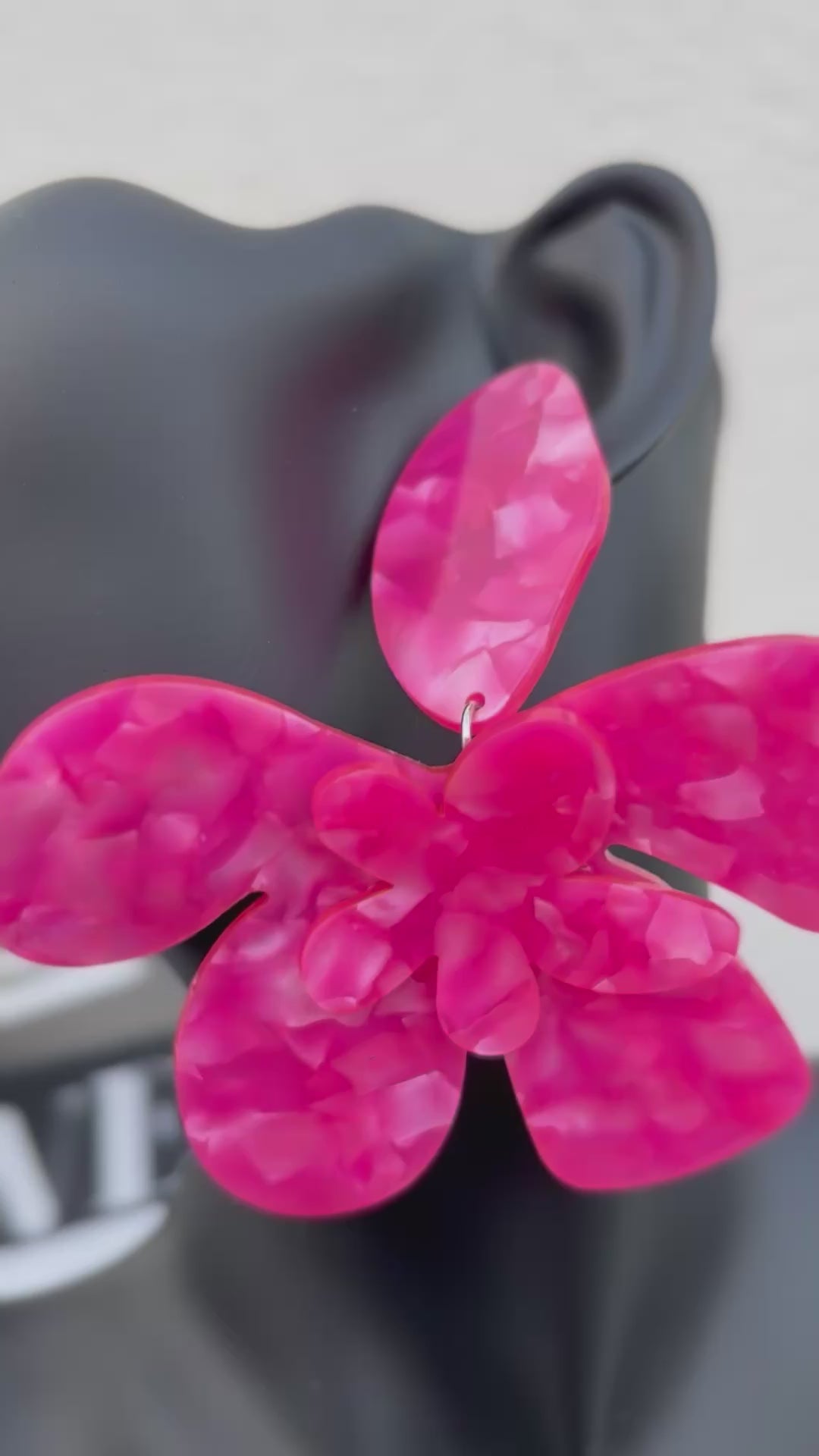 Boucle d’oreille fleur resine